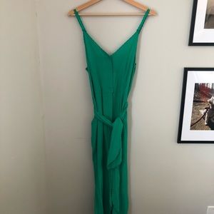 Green jumpsuit with pockets